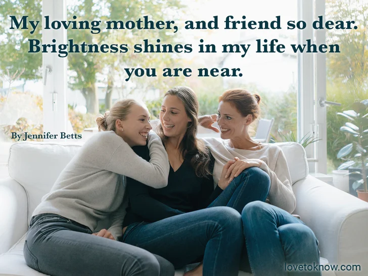 Happy mother with two teenage girls on couch at home and Mother's day poem