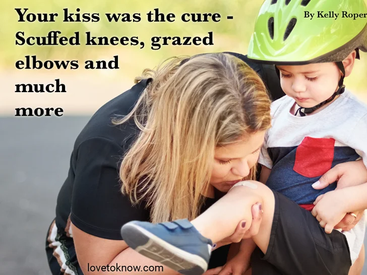 Mother kissing child's injured knee after falling down from a bicycle and Mother's day poem