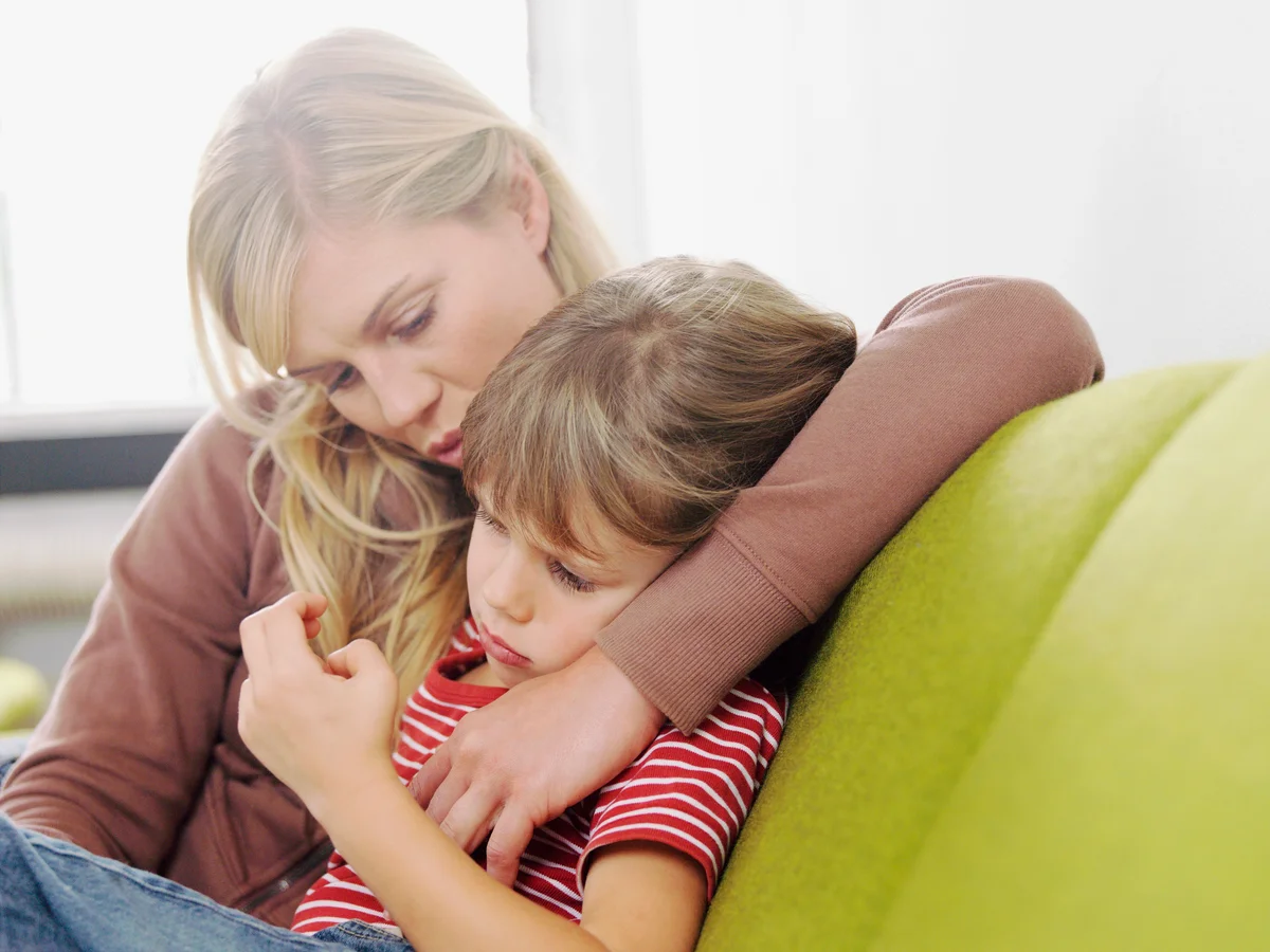 Mom comforting child
