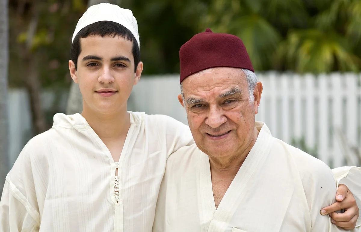 Muslim grandfather and his grandson