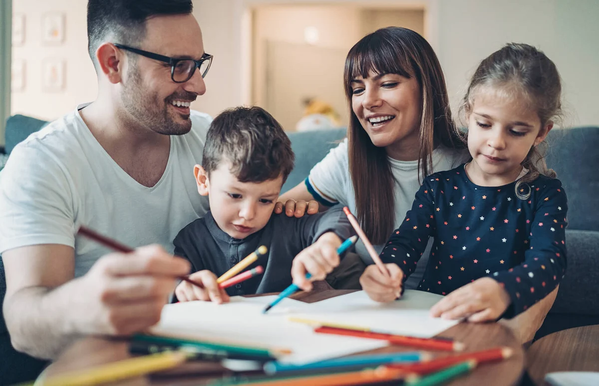 Parents and children coloring pages together