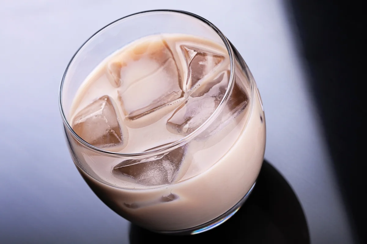 Bartender making Baileys cocktail