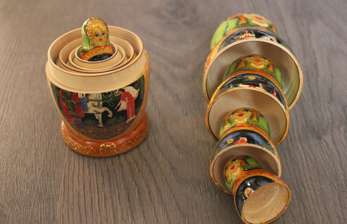 High Angle View Of Multi Colored Russian Nesting Dolls On Table
