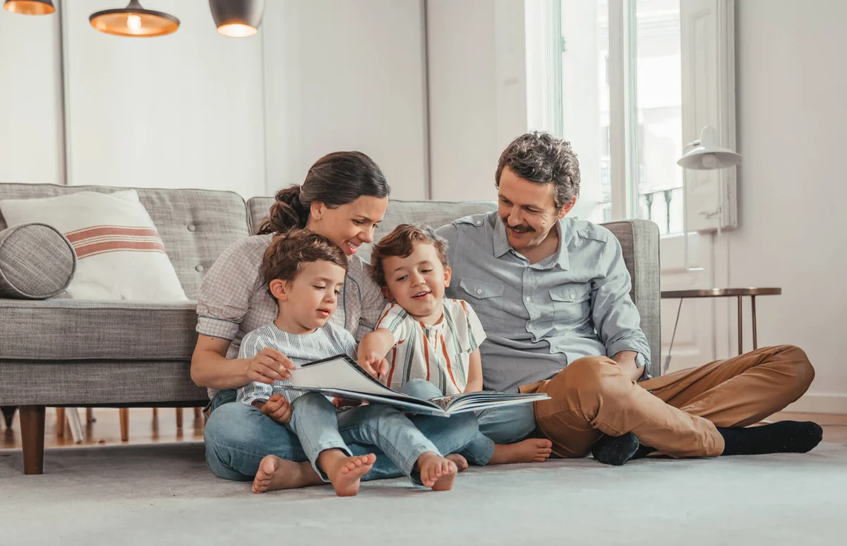 Family reading a book