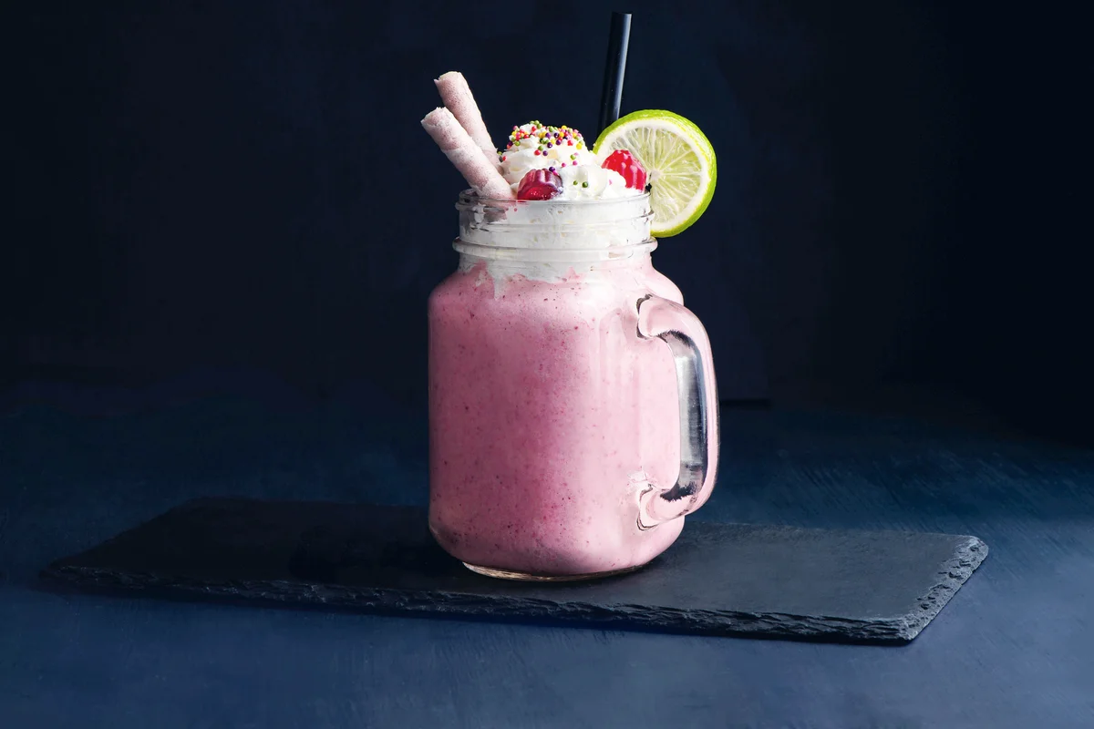 Cold Strawberry Milk with Whipped Cream on Top