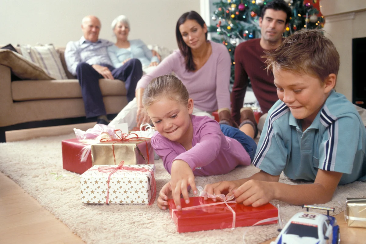 Family opening Christmas gifts