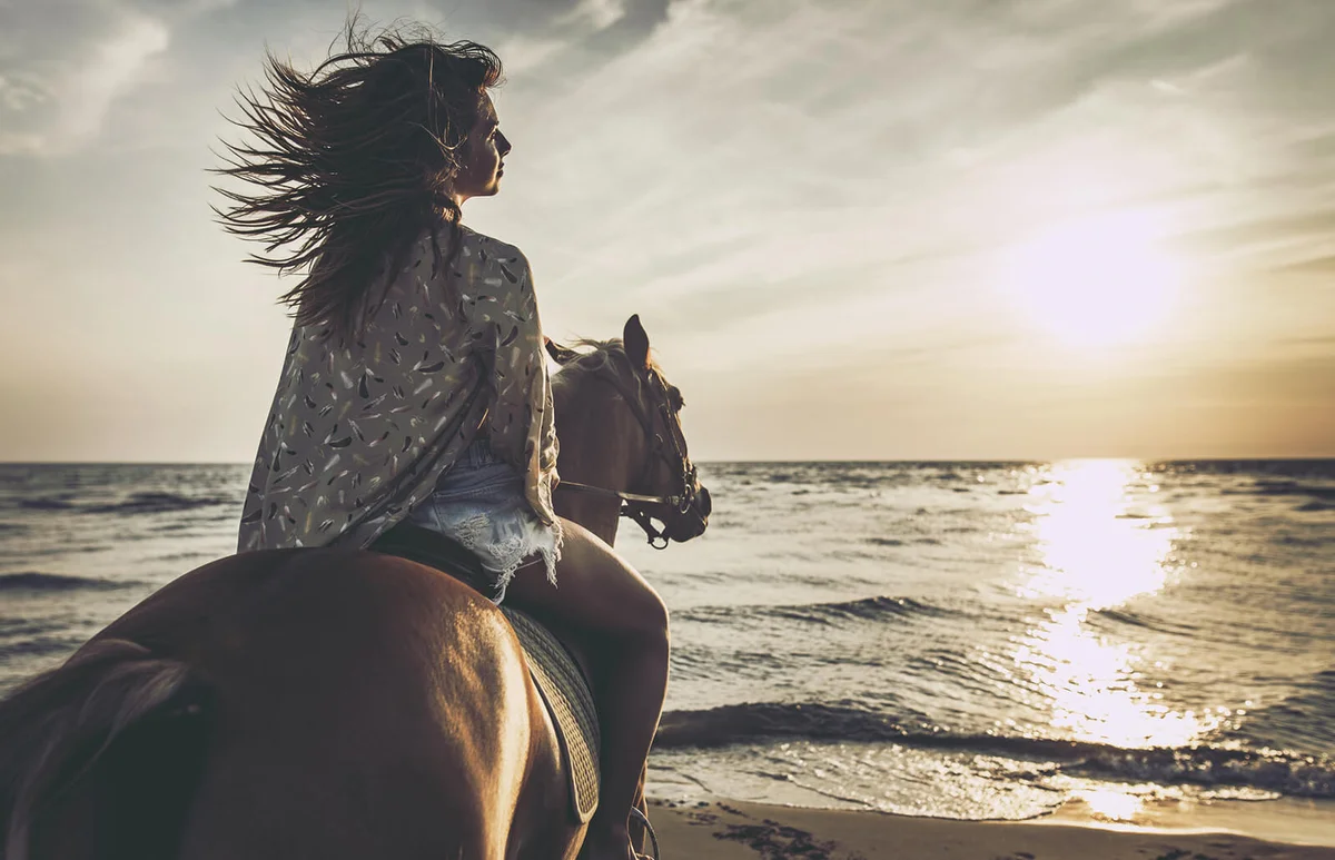 Horseback riding on the beach