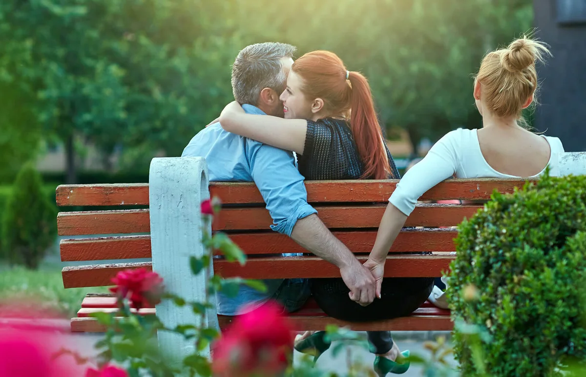 affectionate moment of woman embracing man