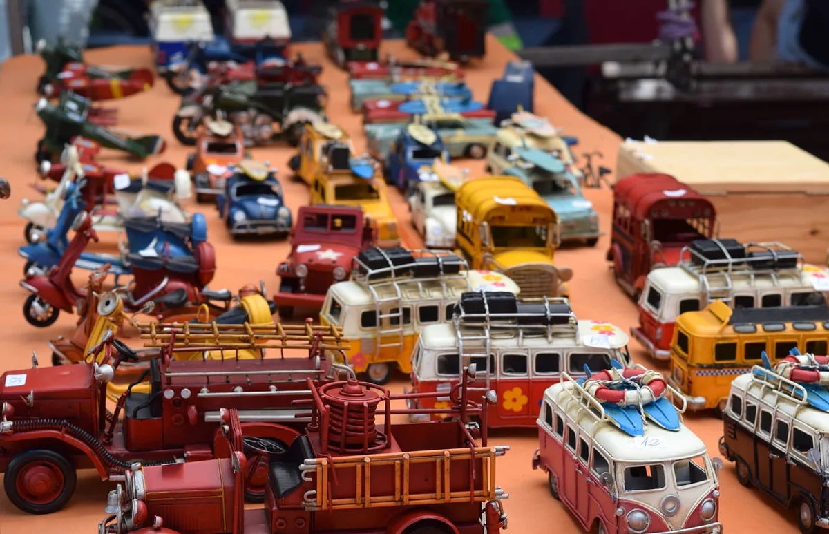 Various Toy Vehicle On Display At Market Stall