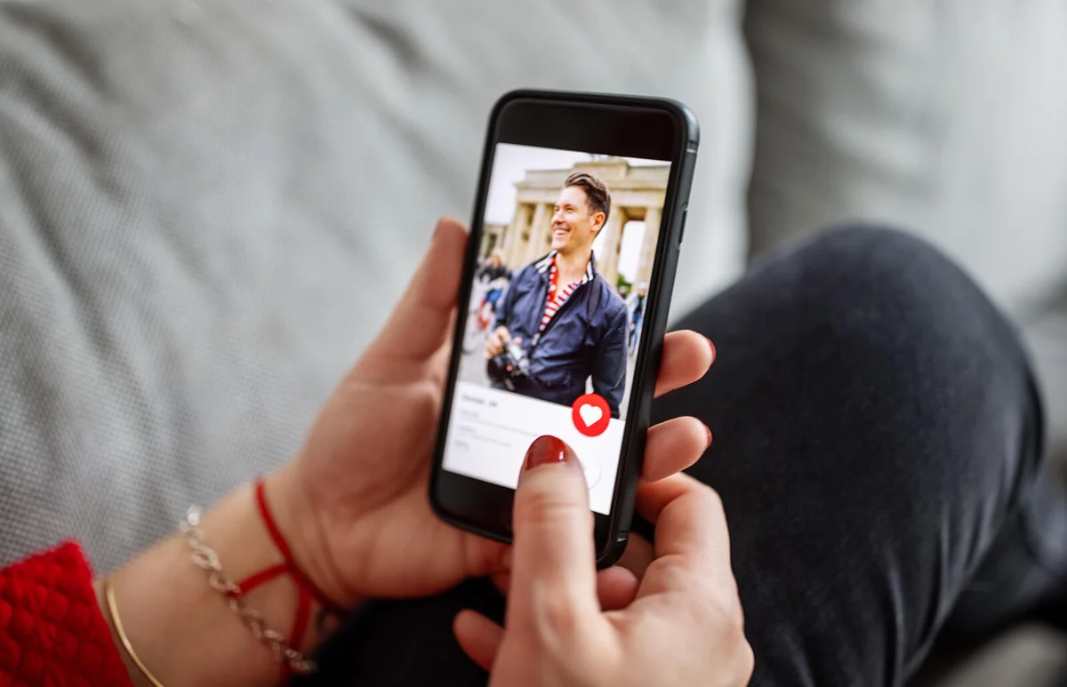 Female using a dating app on smart phone