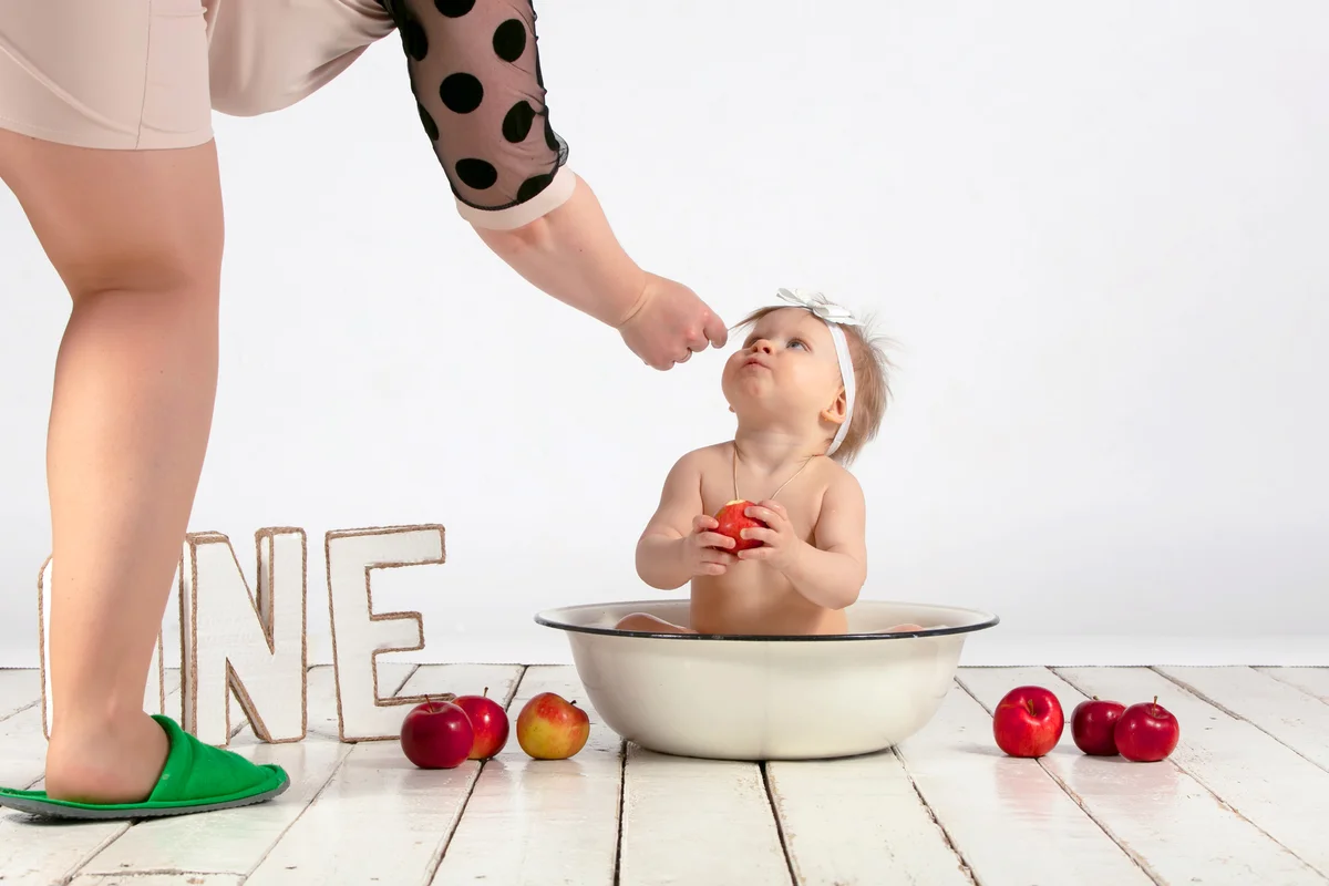 Little girl is being prepared for a photoshoot