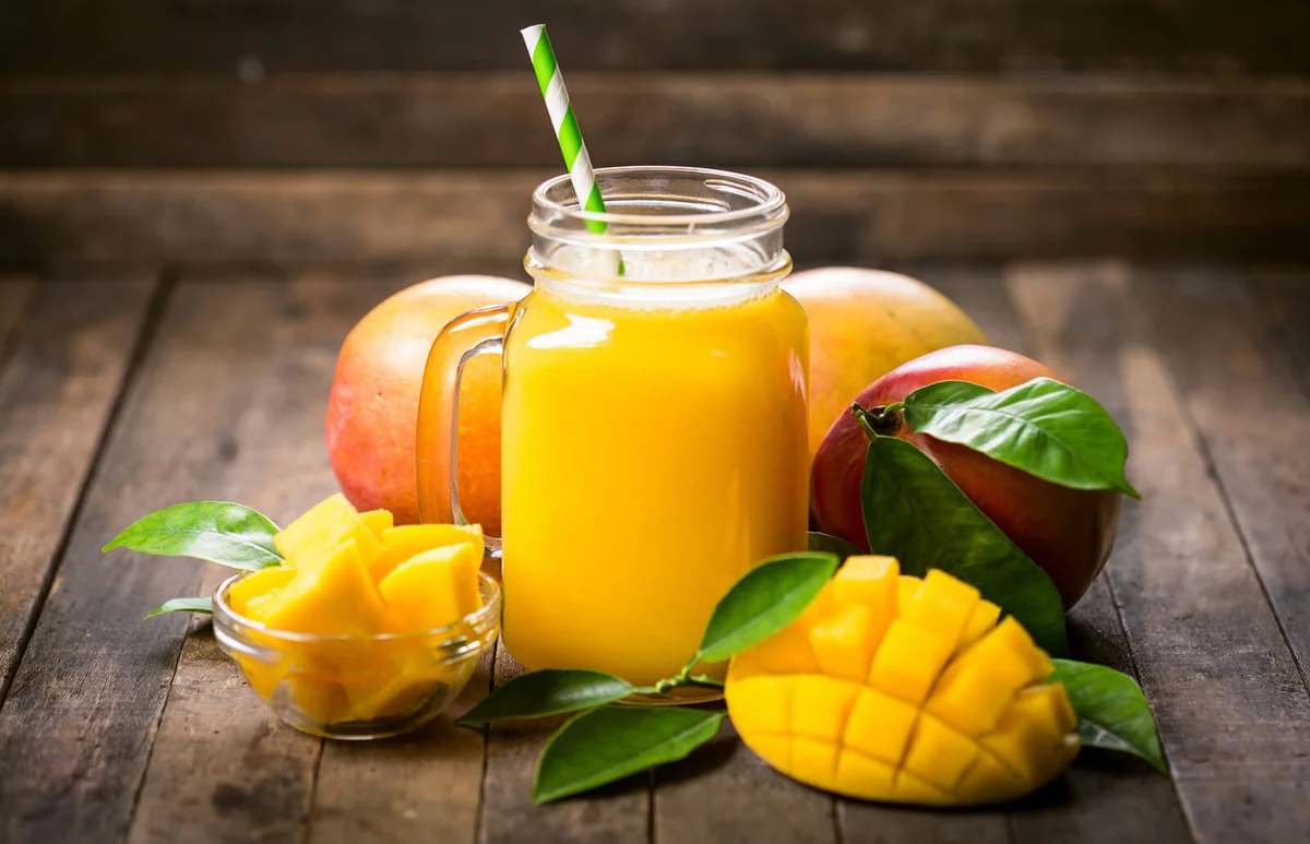 Fresh mango smoothie in the glass