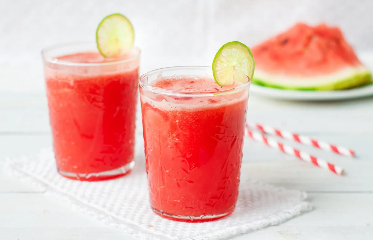 Watermelon lemonade with lime and fresh mint leaves