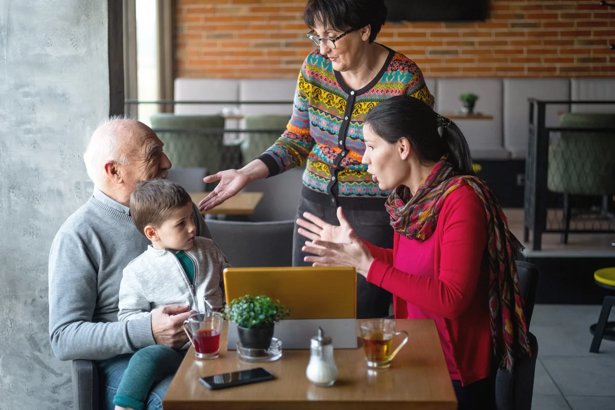 Mother and grandmother fighting with little boy