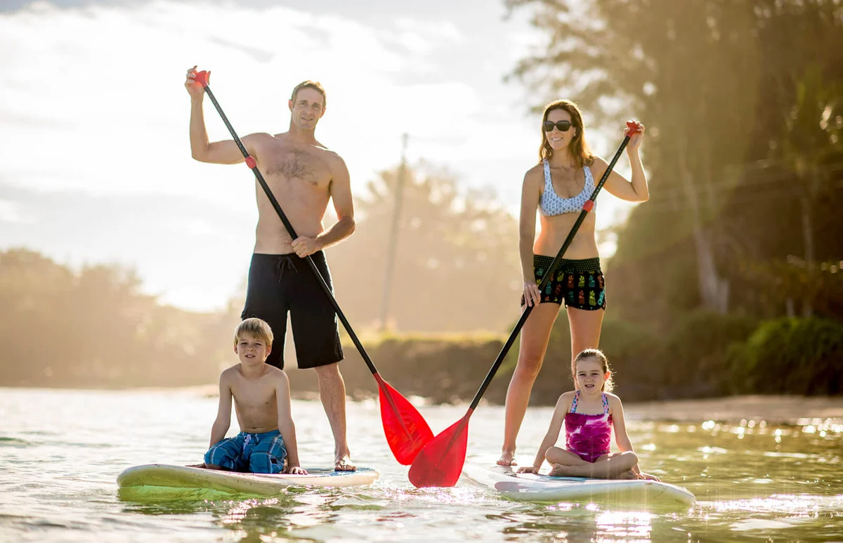 Stand up paddleboarding family