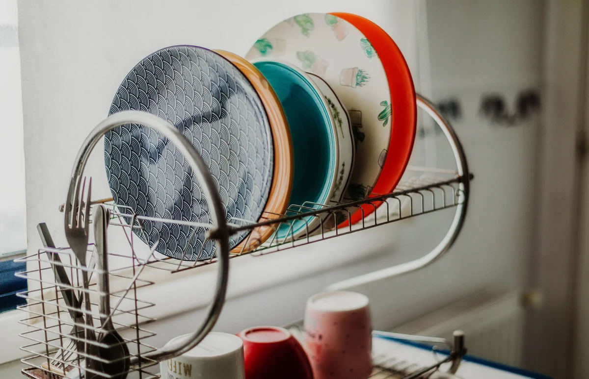 plates on drying board at the kitchen