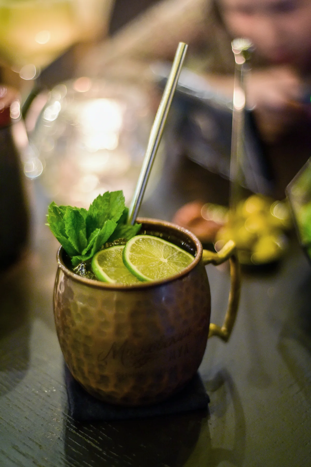 Moscow Mule cocktail in its distinctive hammered copper mug
