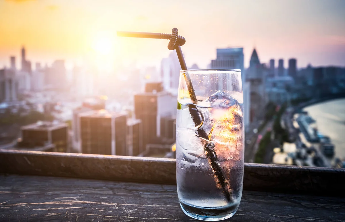 Gin Tonic with Blurred City