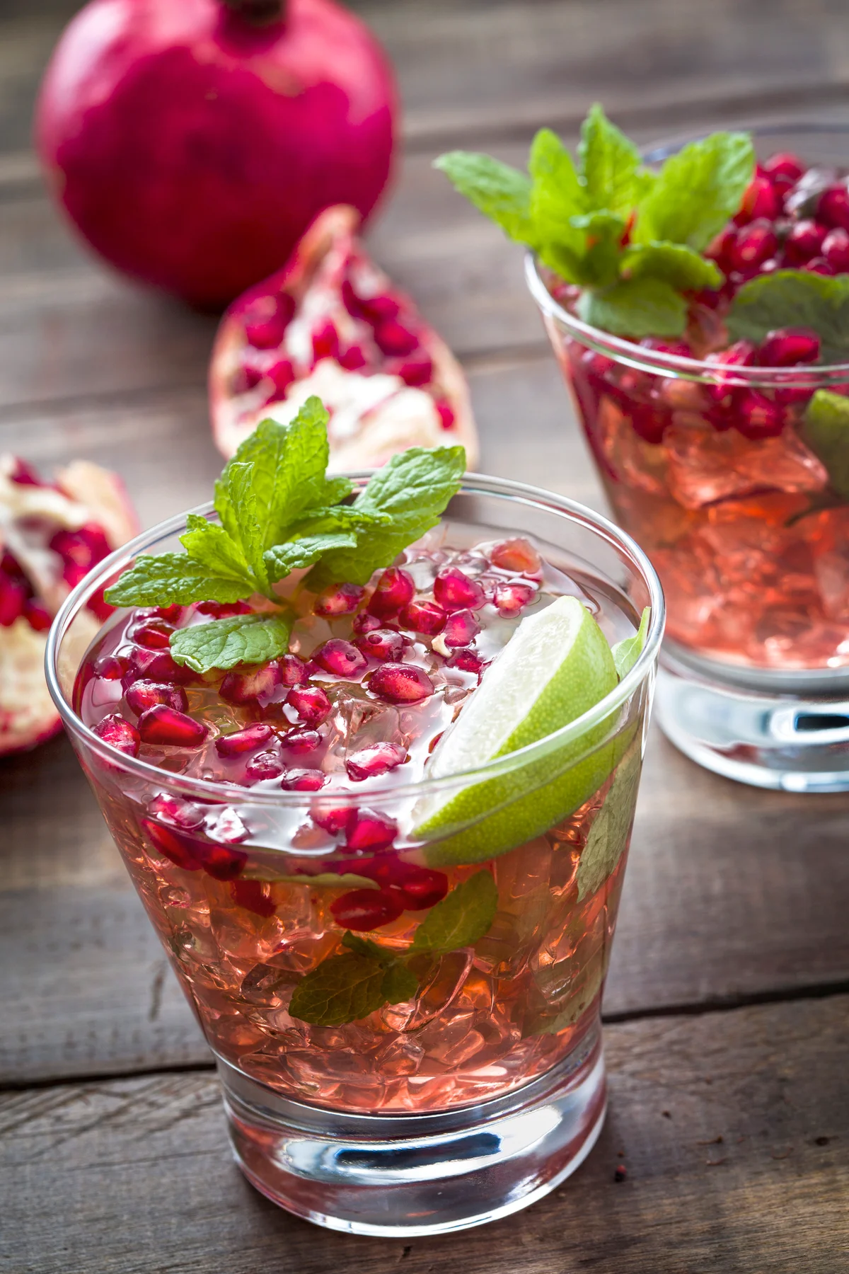 Fresh Pomegranate Ginger Cocktail with Mint and Ice