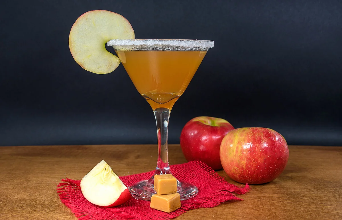 apple cider cocktail with caramel candy