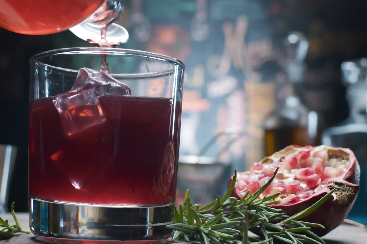 Layered drink with pomegranate