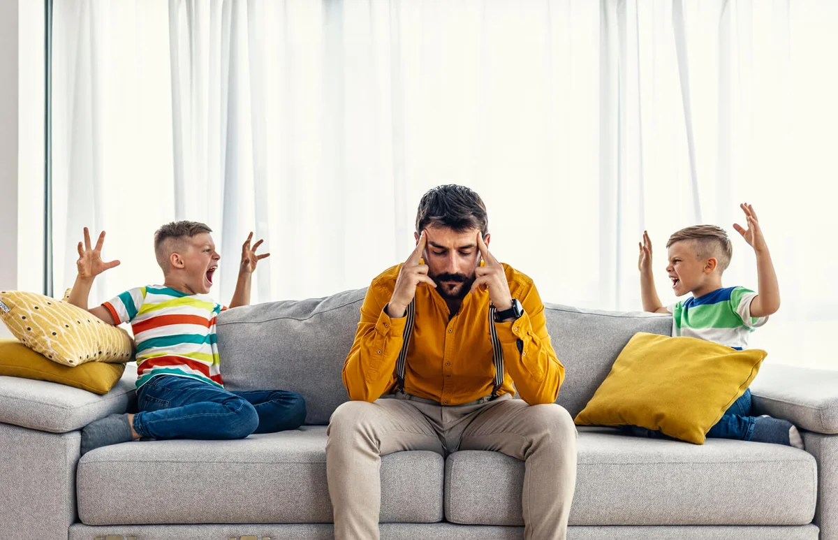 Depressed single father tired of small noisy kids