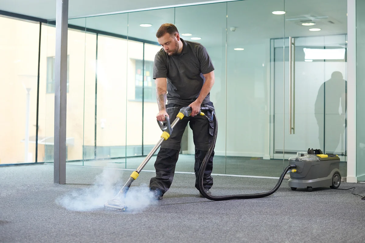 Steam cleaning the office carpe