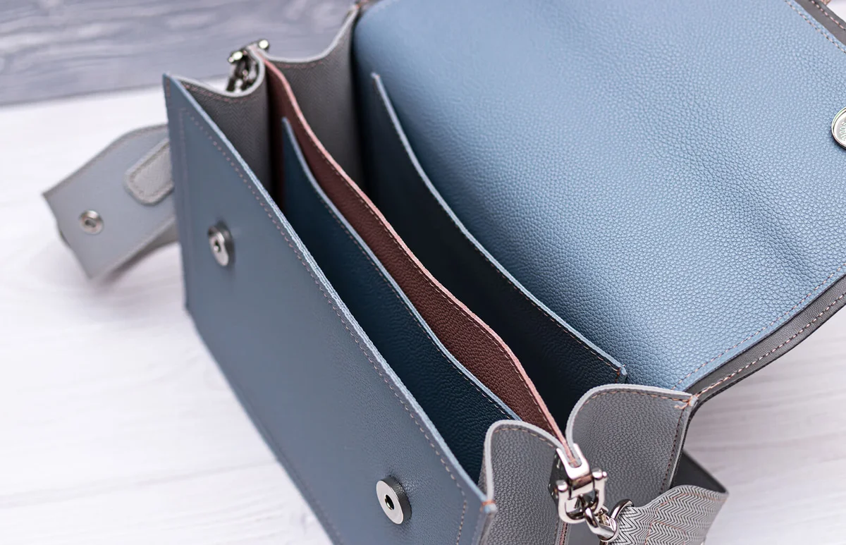 High Angle View Of Purse On Table