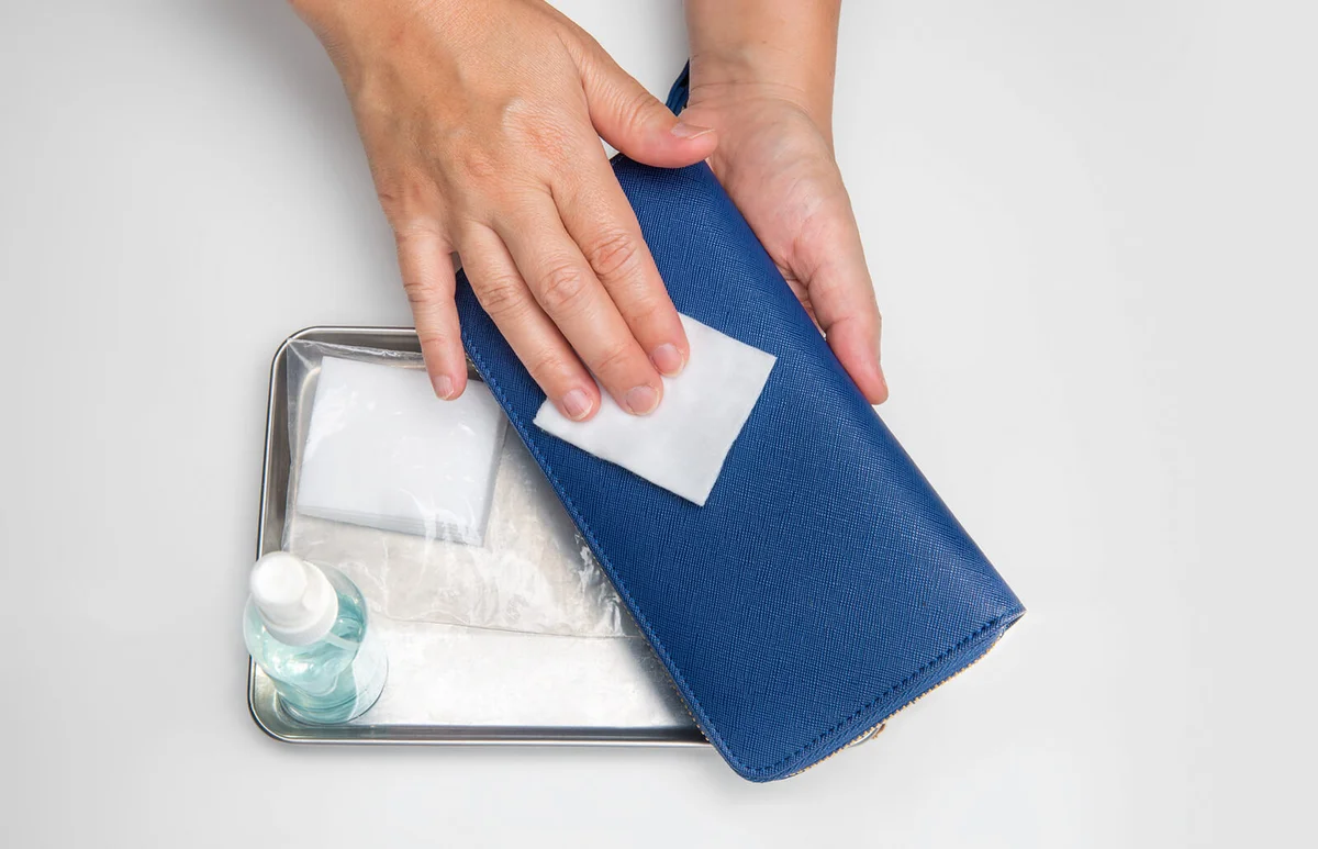 Cleaning wallet with soapy water