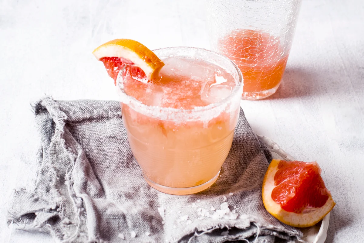 Mexican Paloma cocktail in salt rimmed glass