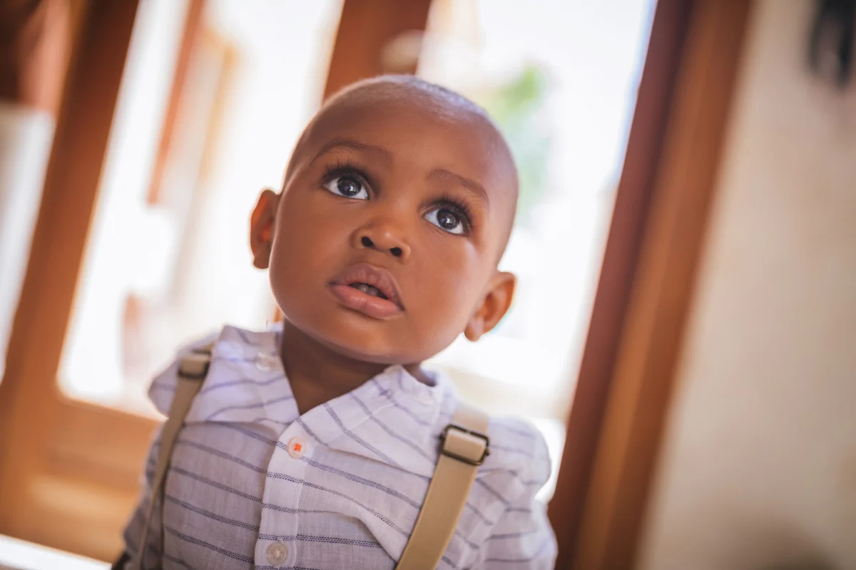 Portrait of cute little baby boy at home