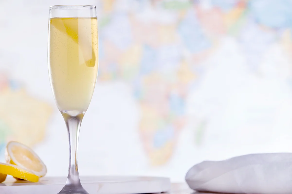 French 75 cocktail with a lemon twist