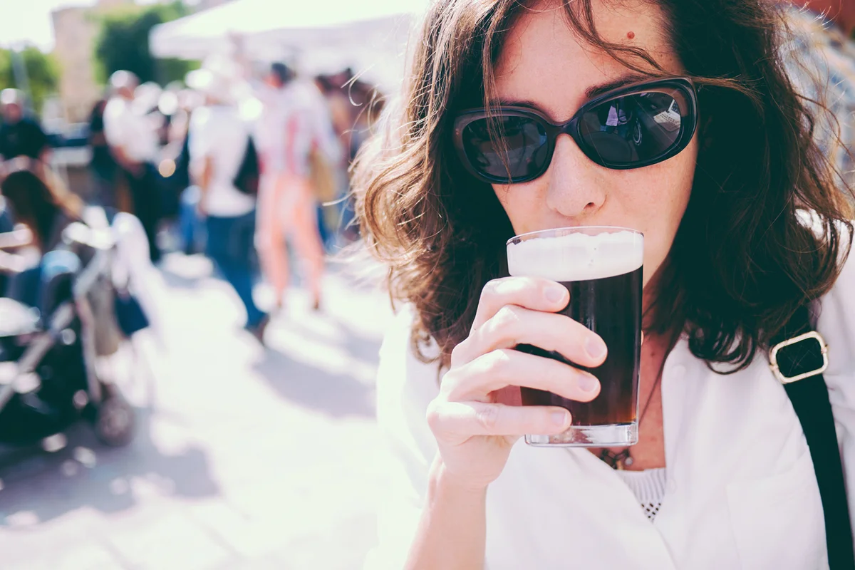 woman drinking stout