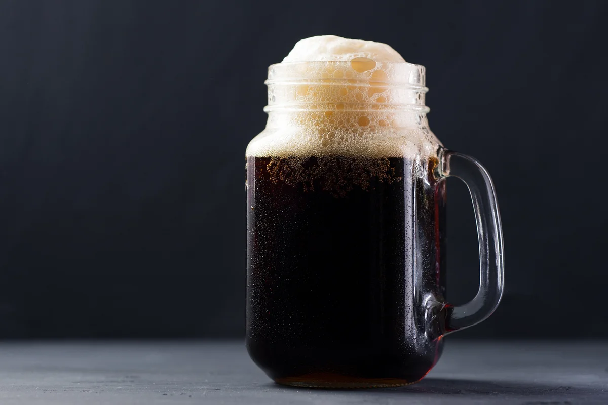 A glass of dark beer