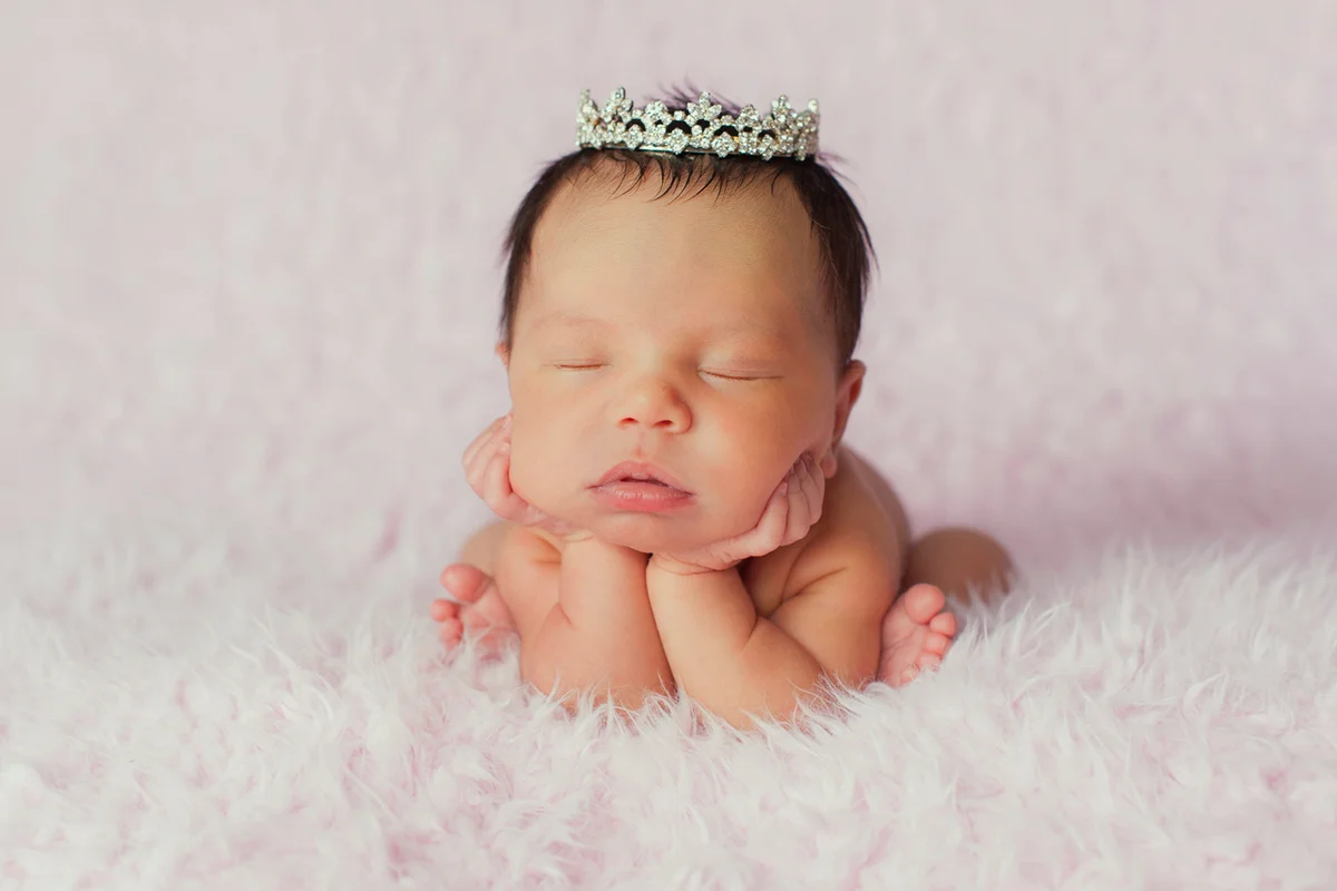 Newborn Baby Girl Wearing a Dainty Rhinestone Crown