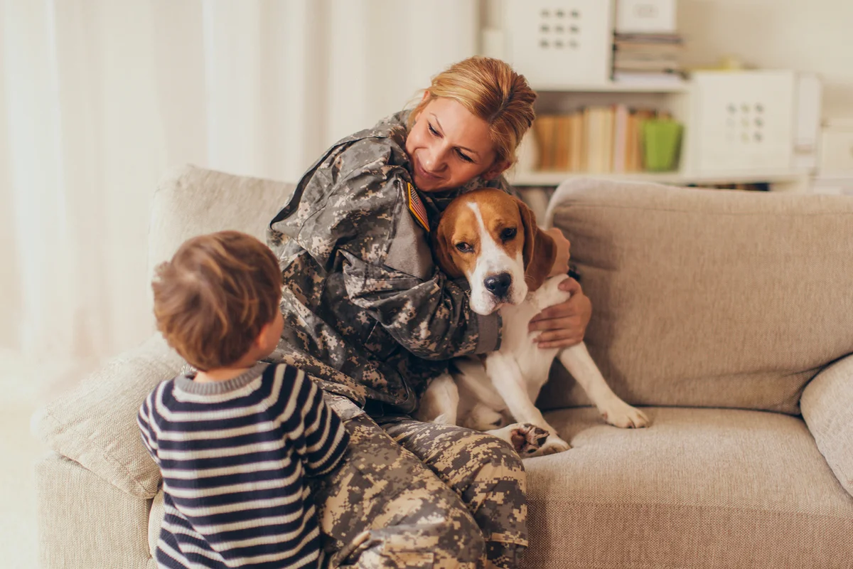 Welcome home mommy soldier with puppy