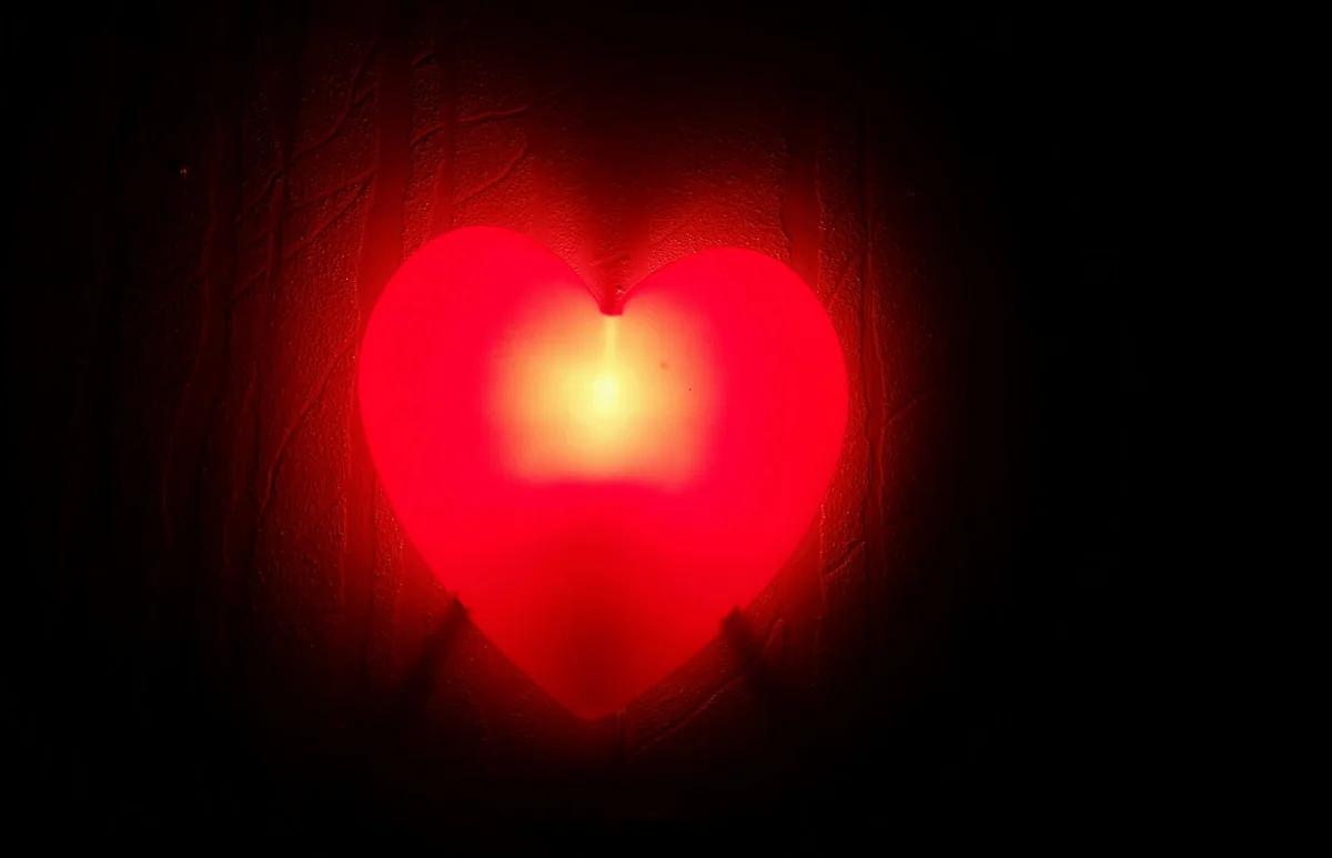 Illuminated Heart Shape Lamp Mounted On Wall