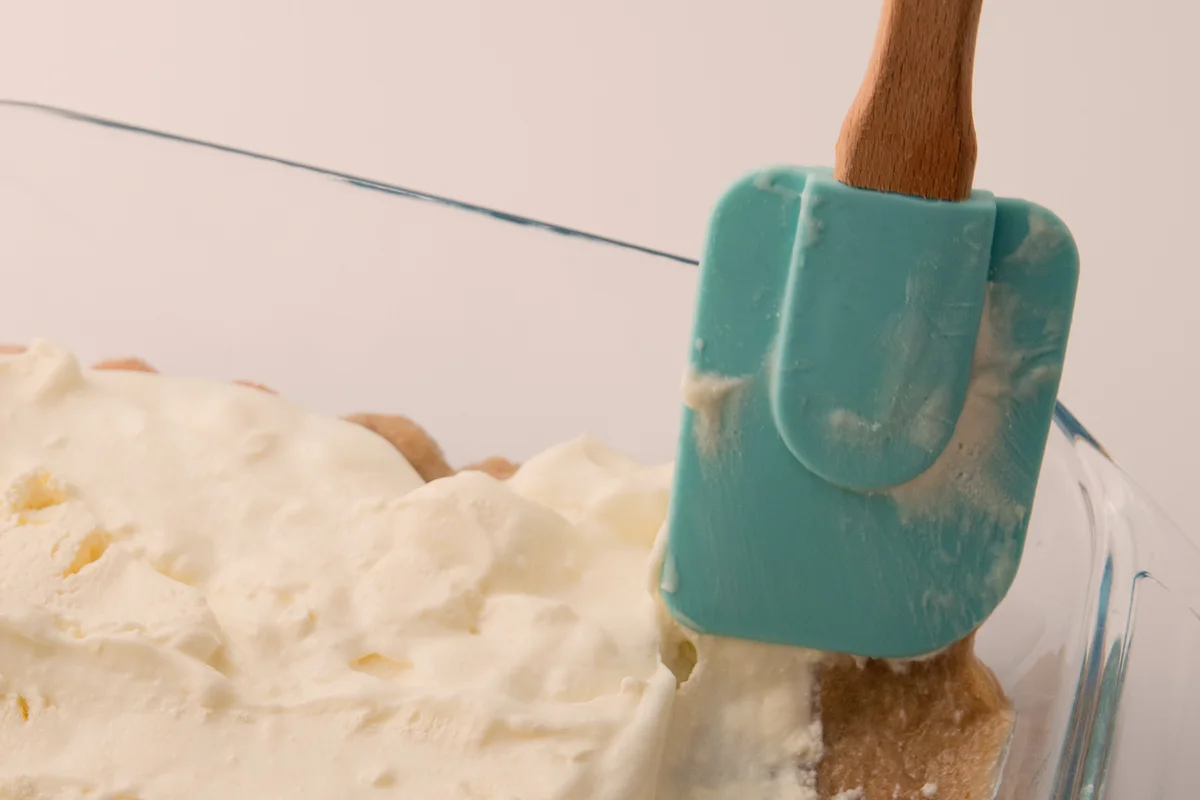 Tiramisu preparation and blue spatula