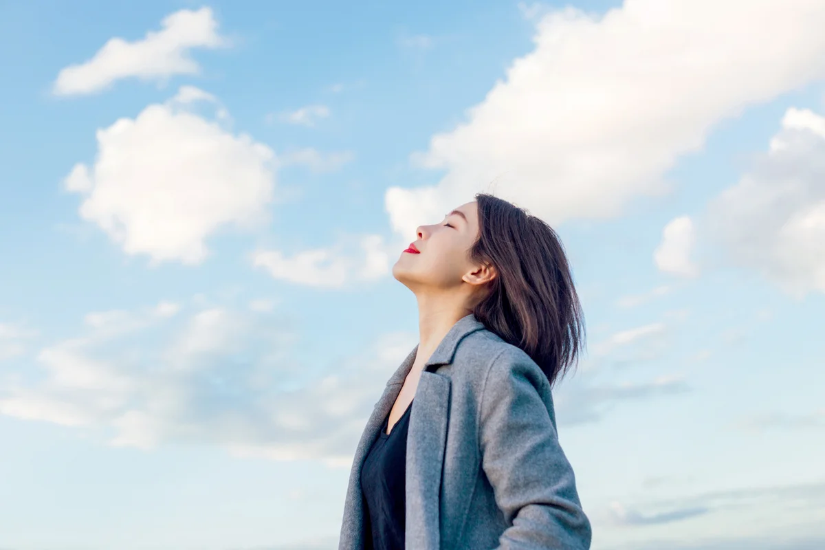 Young Lady Embracing Hope And Freedom