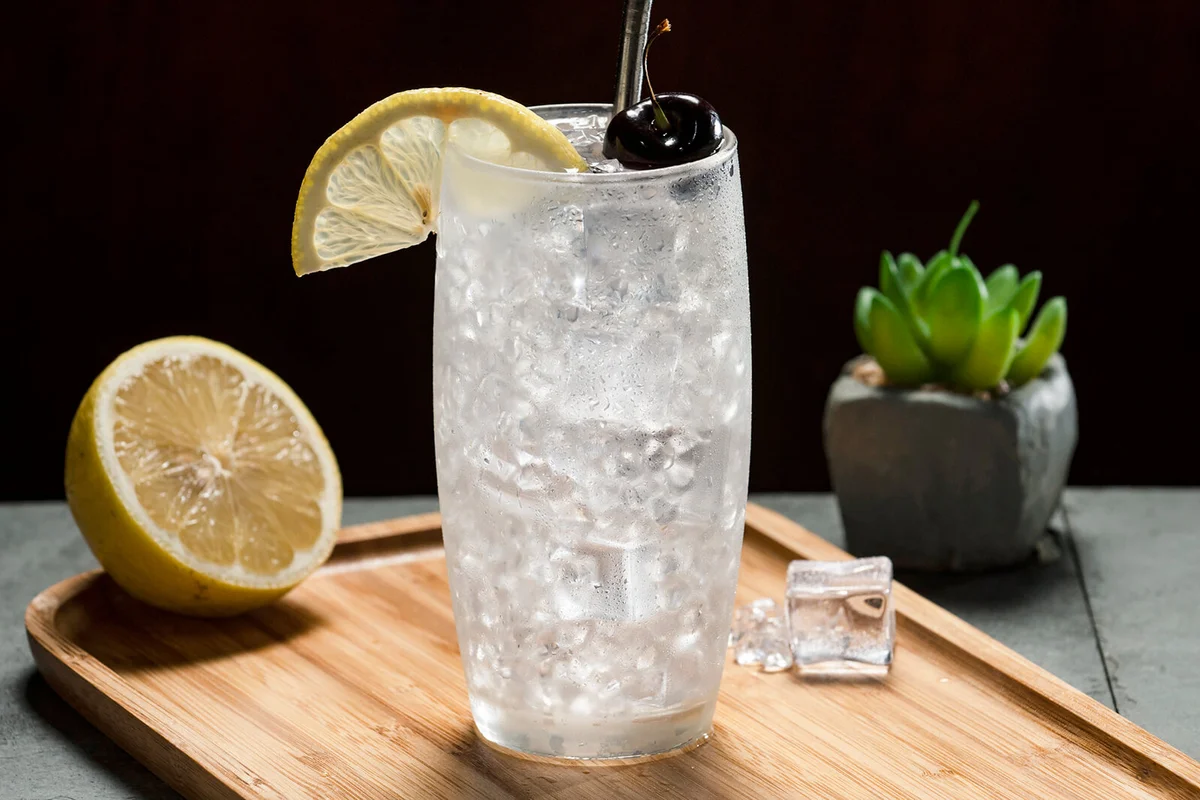 Tom Collins Cocktail In A Black Background