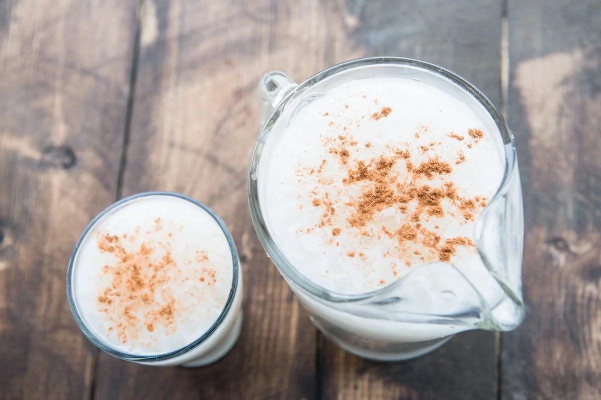 Horchata in a pitcher and glass