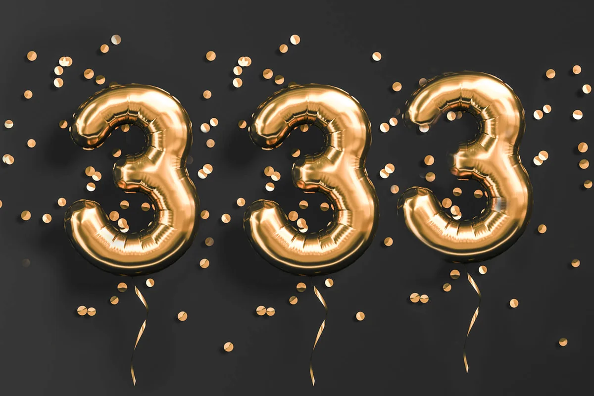 Number 3 flying foil balloon and gold confetti