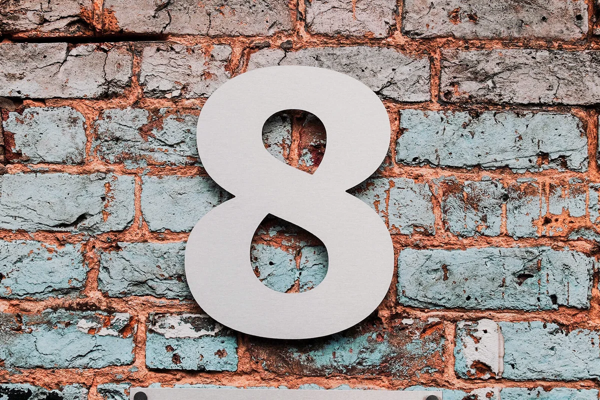 Number 8 Mounted On Brick Wall