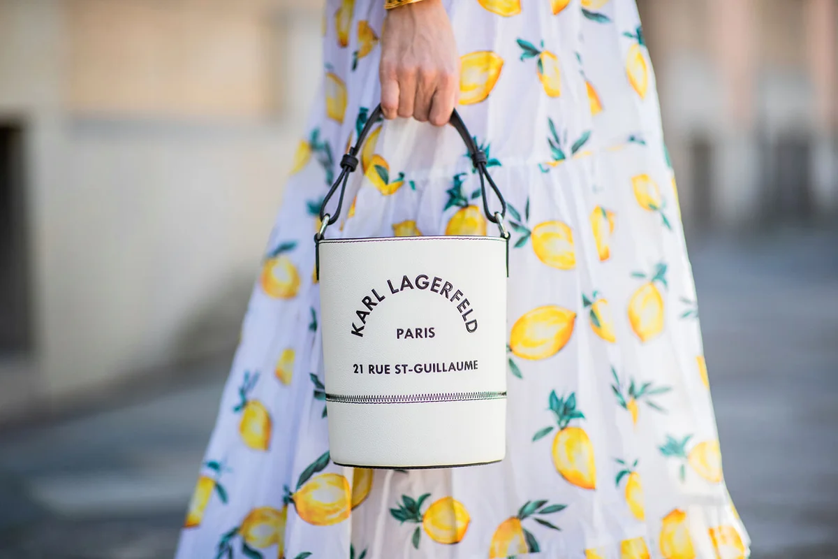 Alexandra Lapp is seen wearing midi dress Maria from Alexandra Miro, Rue St. Guillaume bucket bag from Karl Lagerfeld on July 09, 2020 in Dusseldorf, Germany | Getty Editorial Use