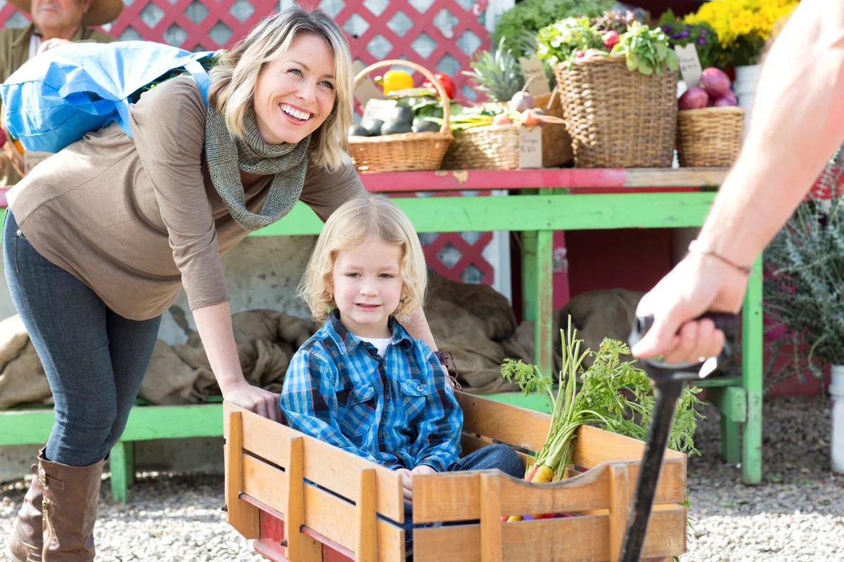 Family shopping at farmers market