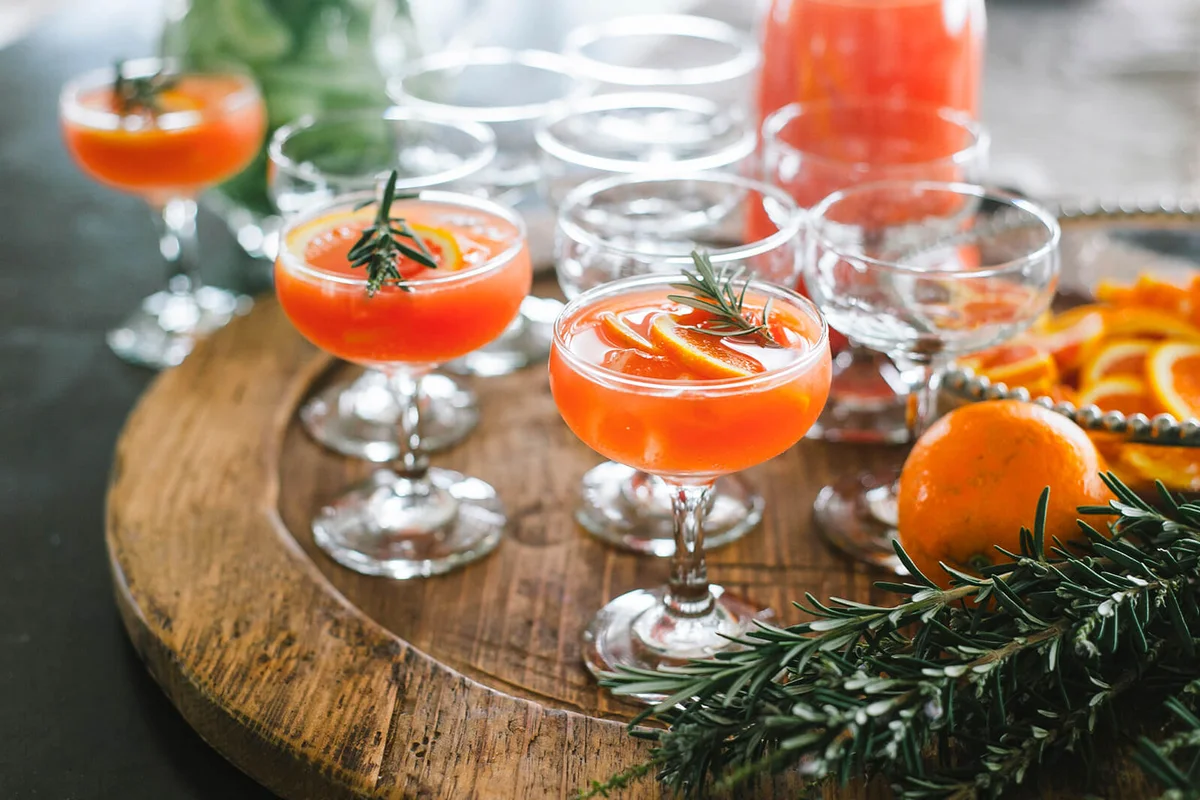 orange gin and tonic cocktails with rosemary