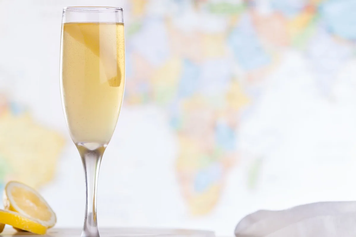 French 75 cocktail with a lemon twist