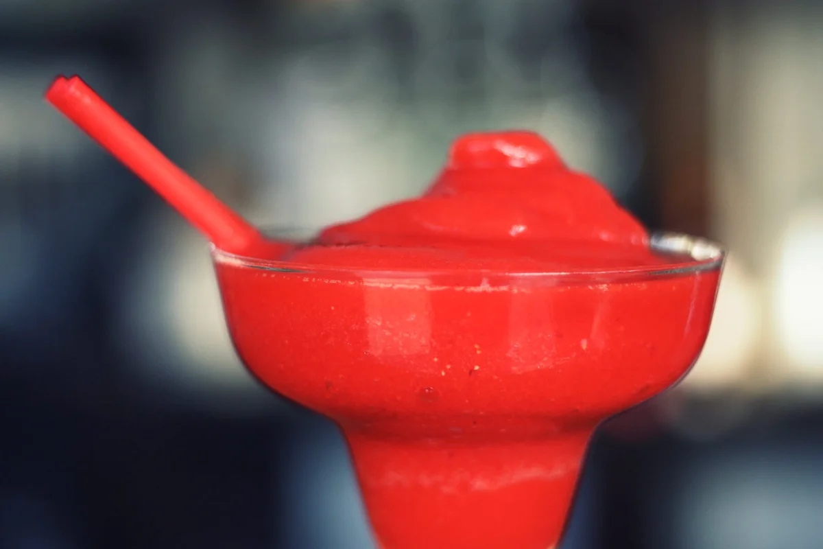 Frozen Margherita, red, cool drink, straw at summer