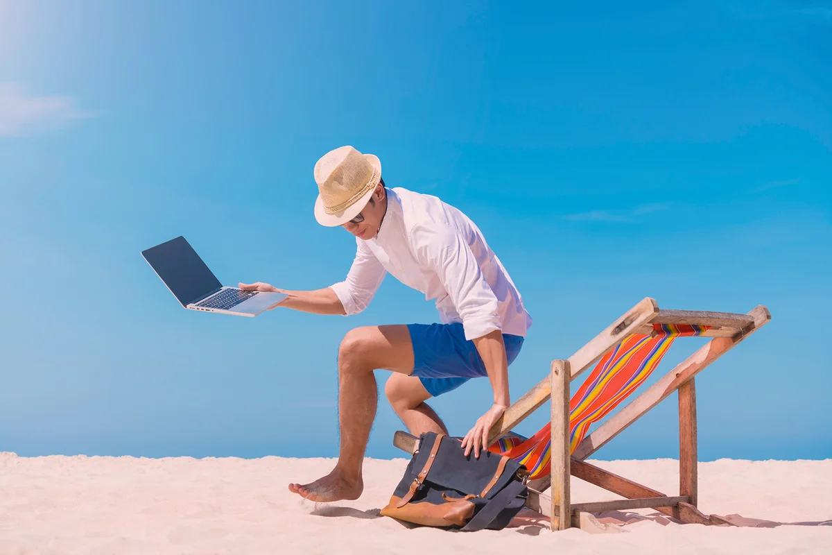 Men at beach with bag
