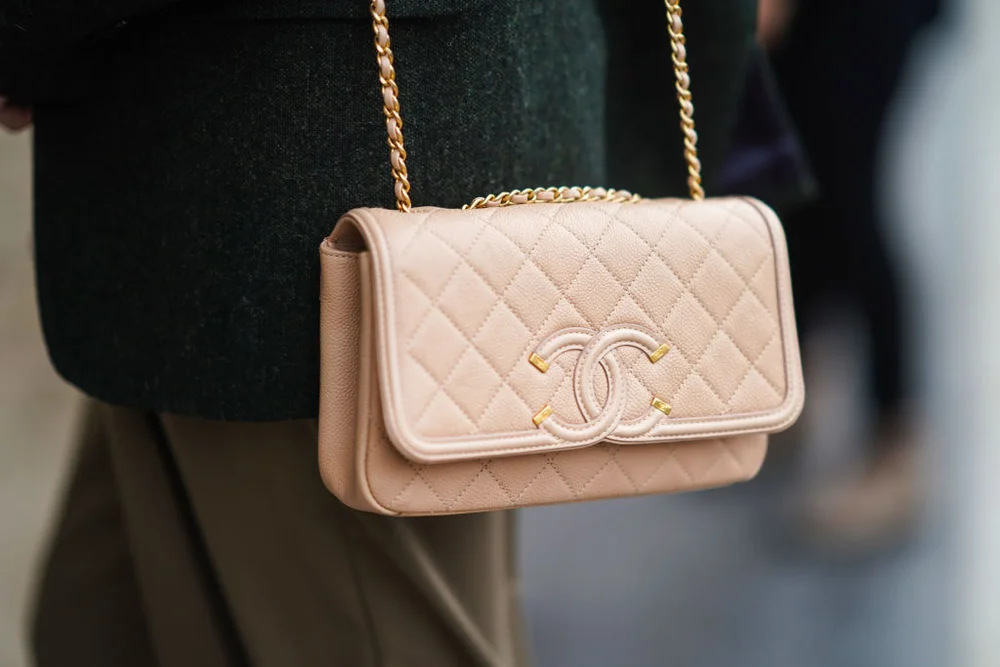 Olesya Senchenko wears a pink quilted Chanel leather bag / Getty Editorial Use